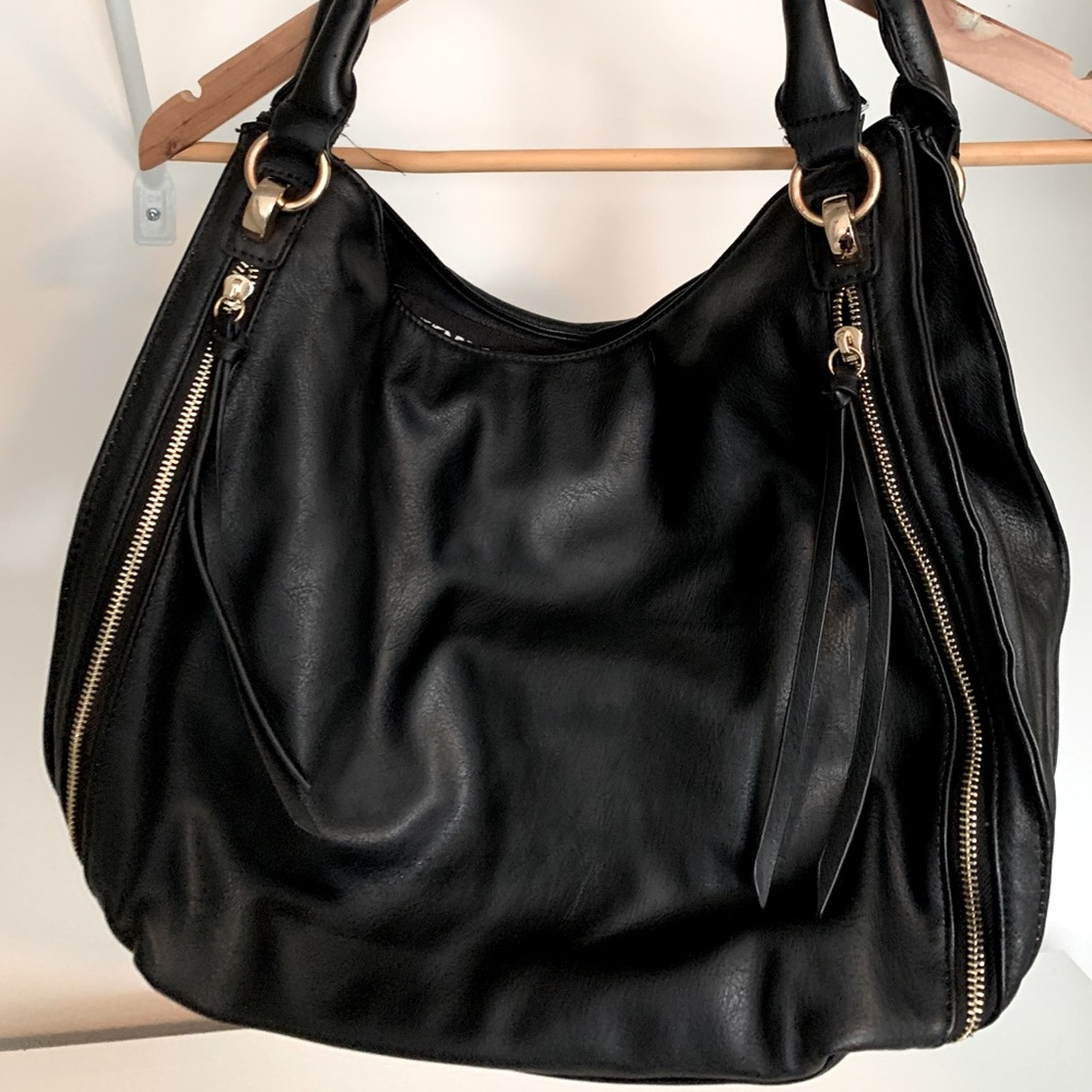 Black purse with Aztec liner